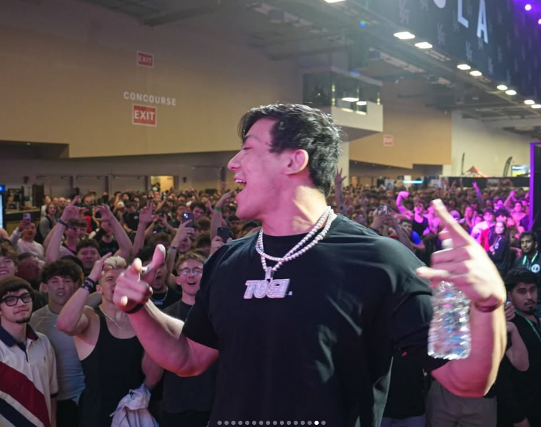 Crowd cheering for TOGSTER at an event