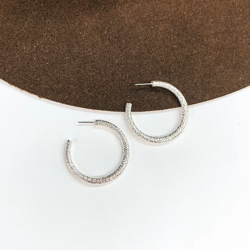 Best hoop earrings with oval shapes for a unique and elongated design-Textured Medium Sized Hoop Earrings in Silver